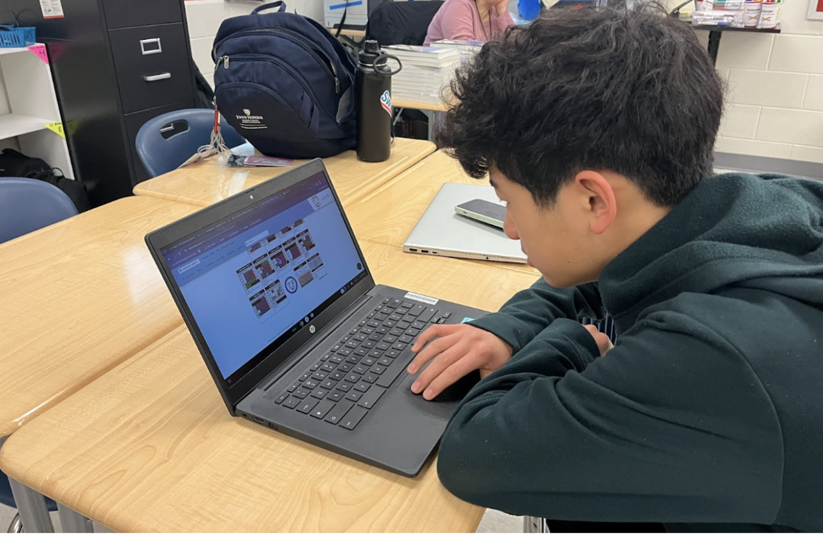 Freshman Nathan Chen looks at the calendar for the school year, which includes one catch-up day for each department per quarter.